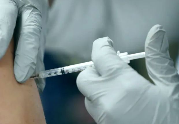 vaccine shot by medical assistant